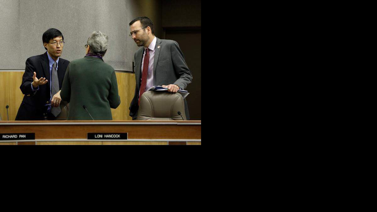 
State Sen. Richard Pan, D-Sacramento, left, talks with Senate Education Committee member Loni Hancock, D-Berkeley, regarding her concerns about the measure he and Sen. Ben Allen, D-Santa Monica, right, co-authored, requiring California schoolchildren to get vaccinated, following a hearing at the Capitol in Sacramento on Wednesday. At the request of Pan and Allen, the committee delayed a vote on the bill to allow them to address some of the issues brought up by committee members. 

