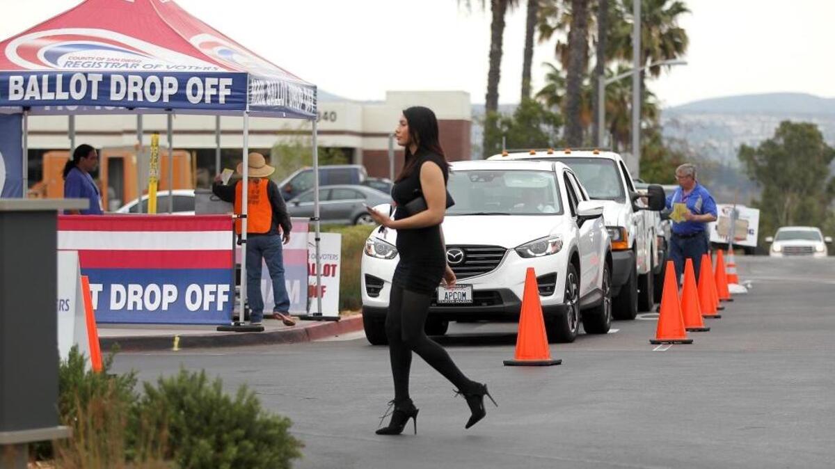 Voters came to the County Registrar of Voters in San Diego on foot and by car to drop off their ballots on Tuesday, June 7, 2016. Election officials in Yolo County said some no-party preference voters wanted to switch their mail ballots for Democratic primary ballots.