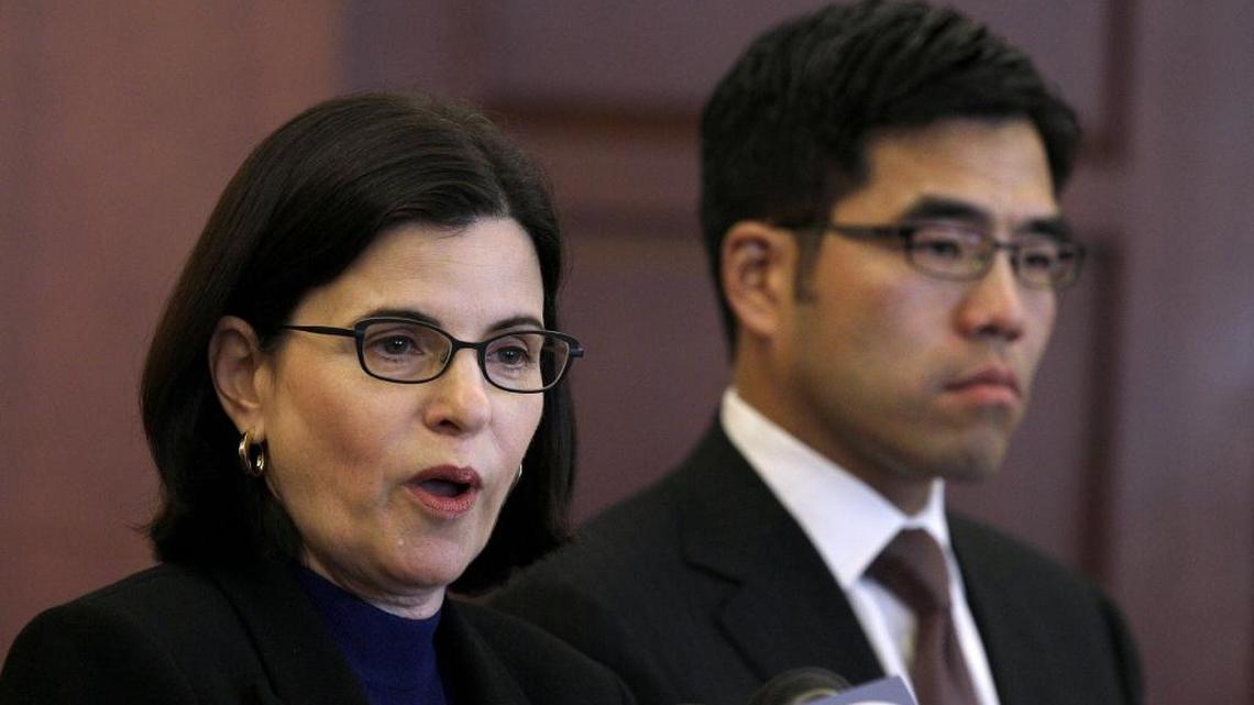 Judge Katherine Feinstein, left, speaks next to Court Executive Officer Michael Yuen at a news conference in San Francisco, Monday, July 18, 2011.
