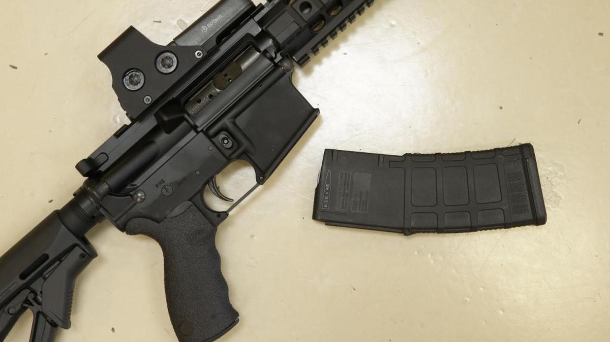 A custom-made semi-automatic hunting rifle with a high-capacity detachable magazine is displayed at TDS Guns in Rocklin, Calif.
