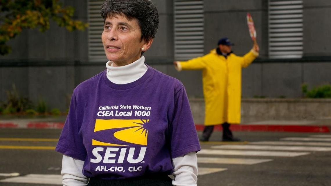 Mariam Noujaim, member of the SEIU Local 1000, stands near the DMV offices in Sacramento on Friday, November 16, 2012.