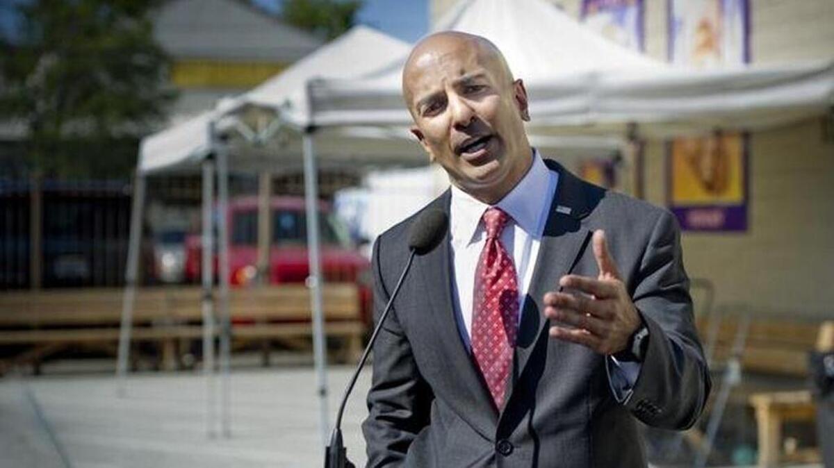 Neel Kashkari speaks at a press conference in front of the River City Food Bank about his experiences living on the street in Fresno on Thursday, July 31, 2014 in Sacramento, Calif.