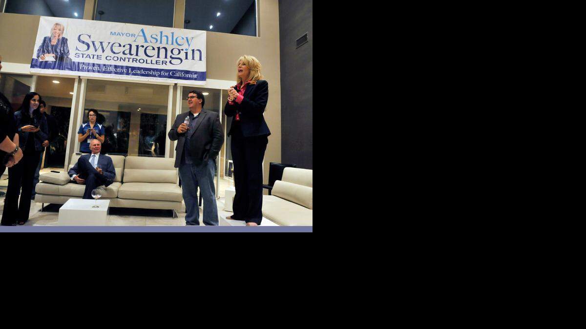 
Ashley Swearengin, right, thanks her supporters in Fresno as they wait for precincts to report results Tuesday night.

