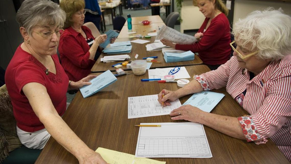 Elections workers count the number of ballots in the El Dorado election office during on election day June 8, 2010. From left are Mary Warden, Doris Morgan and Linda Daniels, all of Placerville, and Alice Maslen of Camino.