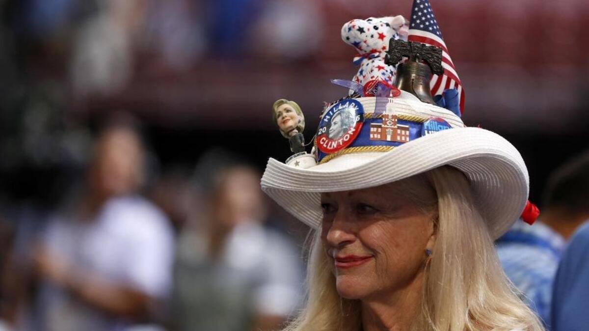 Mississippi delegate Joy Williams shows off her hat as she arrives at the convention floor before the start of the first day of the Democratic National Convention in Philadelphia, Monday, July 25, 2016.