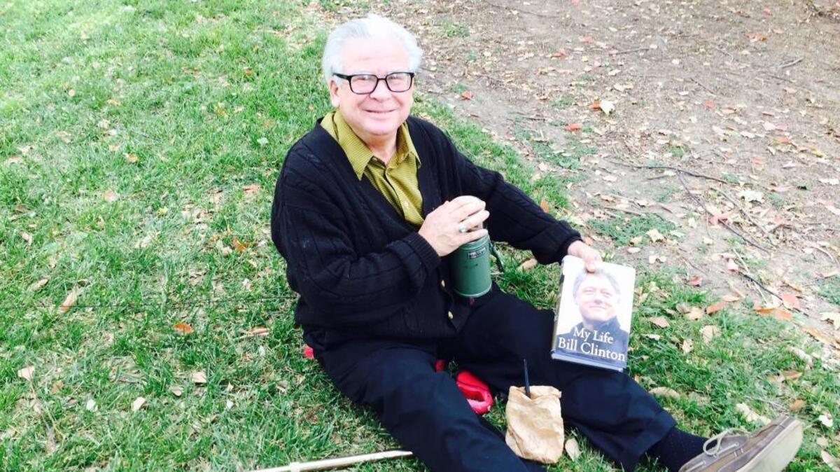 Land Park resident Lanford Tobe hoped he might see former President Bill Clinton as he arrived or left a fundraising event at the home of former state Treasurer Phil Angelides. He brought along a copy of Clinton’s autobiography, hoping to get it signed.