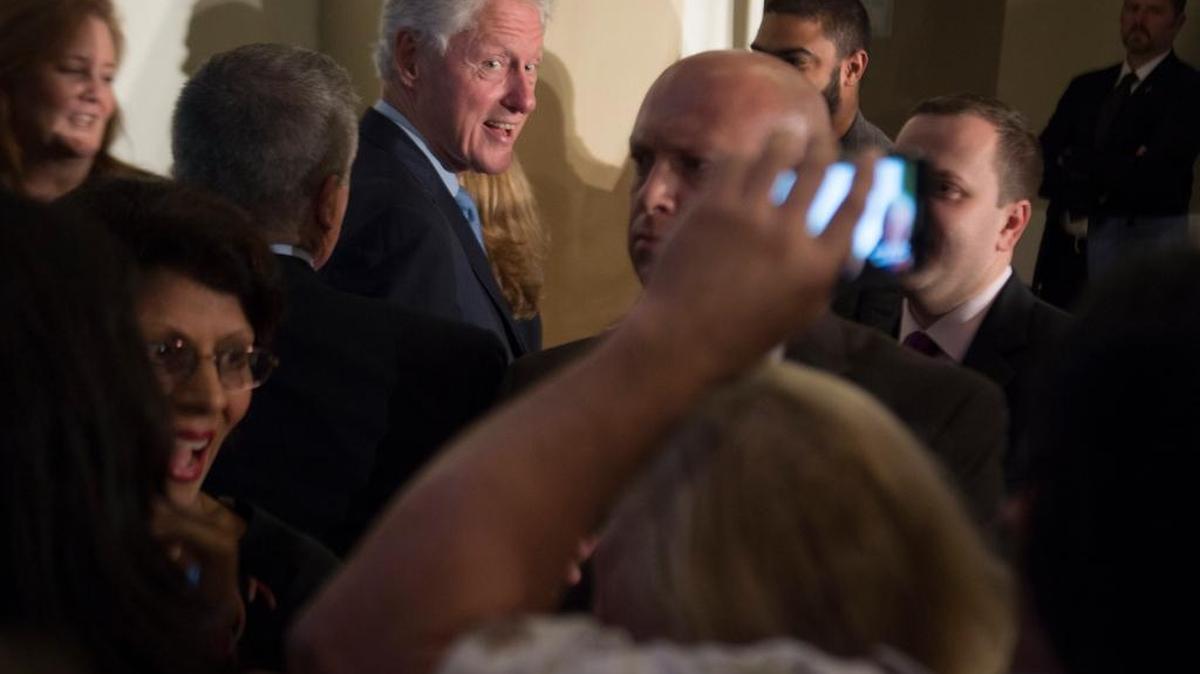 Former President Bill Clinton looks back at supporters after speaking at a rally at Sacramento State on behalf of his wife, Hillary Clinton, on Monday afternoon, May 23, 2016.