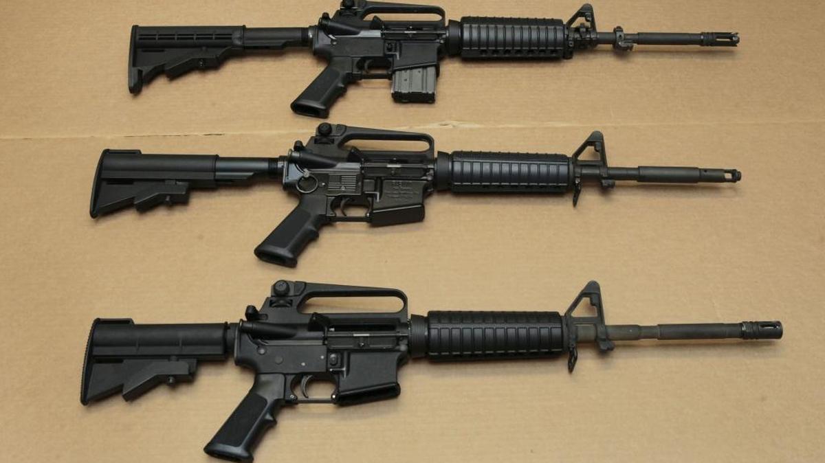 Three variations of the AR-15 assault rifle are displayed at the California Department of Justice in Sacramento, Calif. While the guns look similar, the bottom version is illegal in California because of its quick reload capabilities. Omar Mateen used an AR-15 that he purchased legally when he killed 49 people in an Orlando nightclub. 2012 file photo.