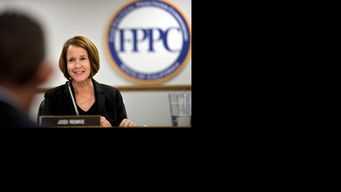 <137>FOR USE WITH PEOPLE TO WATCH 2014 please ck with picture desk before using. thanks....sm <137>Jodi Remke conducts business during a meeting on <137>Thursday,<137> Nov. 20<137>, 2014<137> in Sacramento<137>, Calif<137>. Remke is the new leader of the Fair Political Practices Commission. She<137>’s taking<137> took over after the previous chairman, Ann Ravel, was elevated to the Federal Election Commission by President Barack Obama.