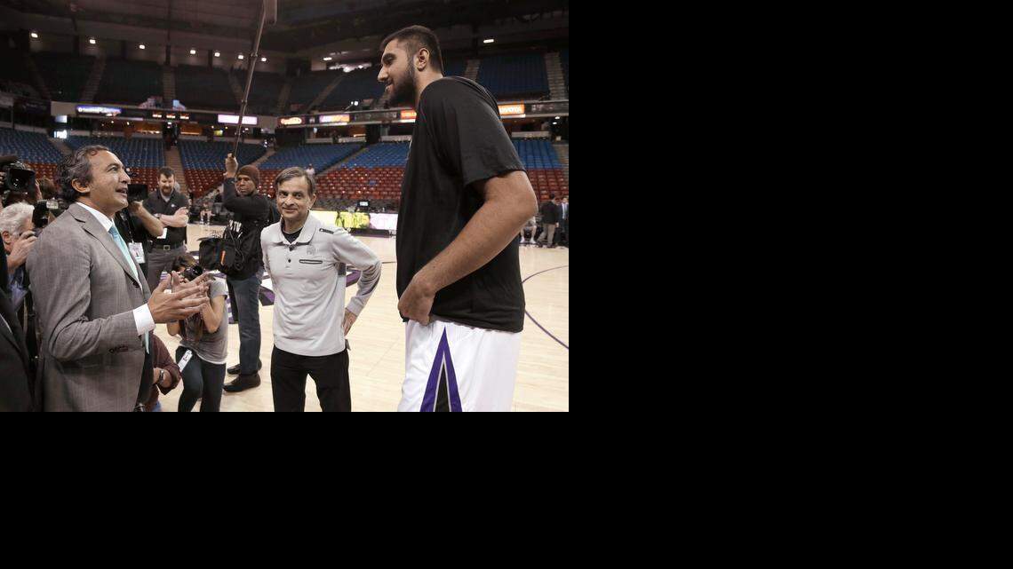 
Rep. Ami Bera, left, D-Elk Grove, and Sacramento Kings Chairman Vivek Ranadive talk with Kings rookie center Sim Bhullar before the Kings game with the New Orleans Pelicans on Friday. All three men are of Indian descent, and Bhullar is the first such player in the NBA.
