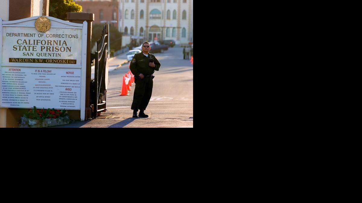 
A prison guard stands the the east gate of San Quentin Prison
