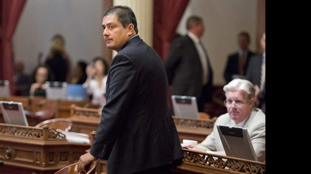 
Sen. Ben Hueso, D-San Diego enters the Senate floor in August 2014 as he returns to the Capitol following his DUI arrest.
