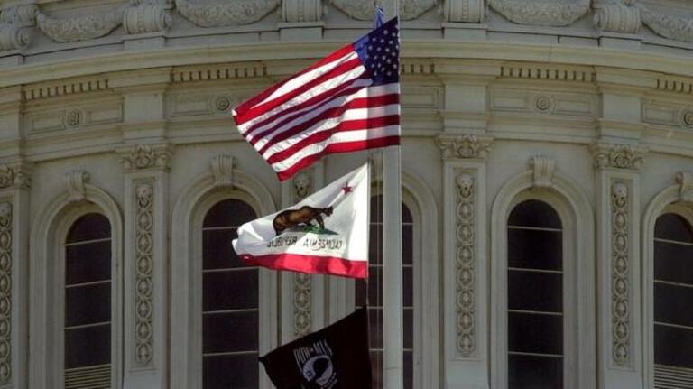 Why are California’s flags flying at half-staff?