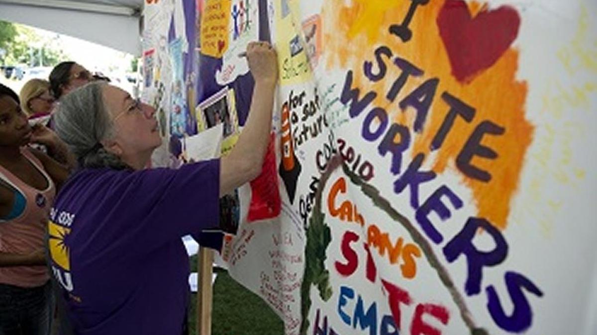 SEIU Local 1000 members and supporters gathered at the State Capitol in 2010 to protest a proposed cut to their salaries. UAW Local 2350 has accepted a new labor contract with SEIU, despite cuts it makes to benefits.