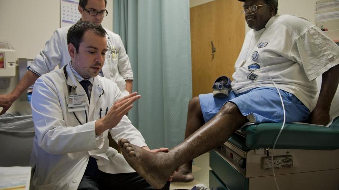 
Retiree Daniel Heidelburg is examined by UC Davis Doctor George Gallardo. 
