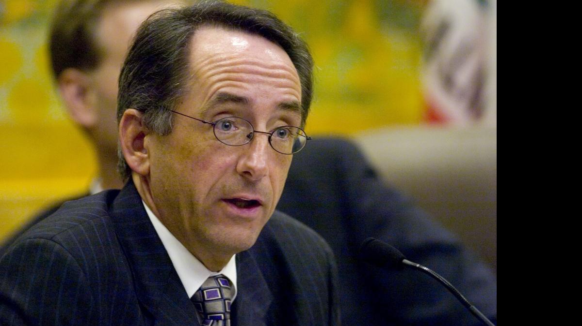 
Joe Dunn, when he served in the state Senate, speaks during a committee hearing. He went on to serve four years as executive director of the California State Bar until he was fired in December.
