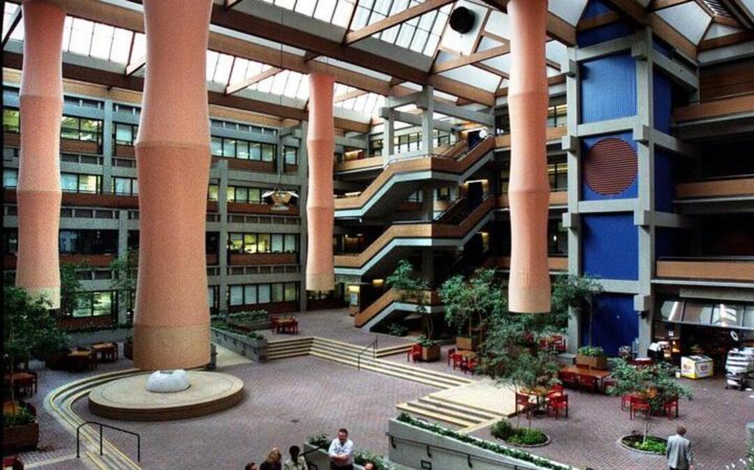 
The one-of-a-kind State of California office structure in downtown Sacramento known as The Bateson Building – designed and built during Gov. Jerry Brown’s first two terms as governor – was touted as “energy efficient” when built in the early 1980s. The distinctive interior of the building, with its overhead skylights and sun louvers to its quartet of unique, tubular “stratification fans” hanging from the atrium ceiling, is shown in this view taken May 15, 2001. 
