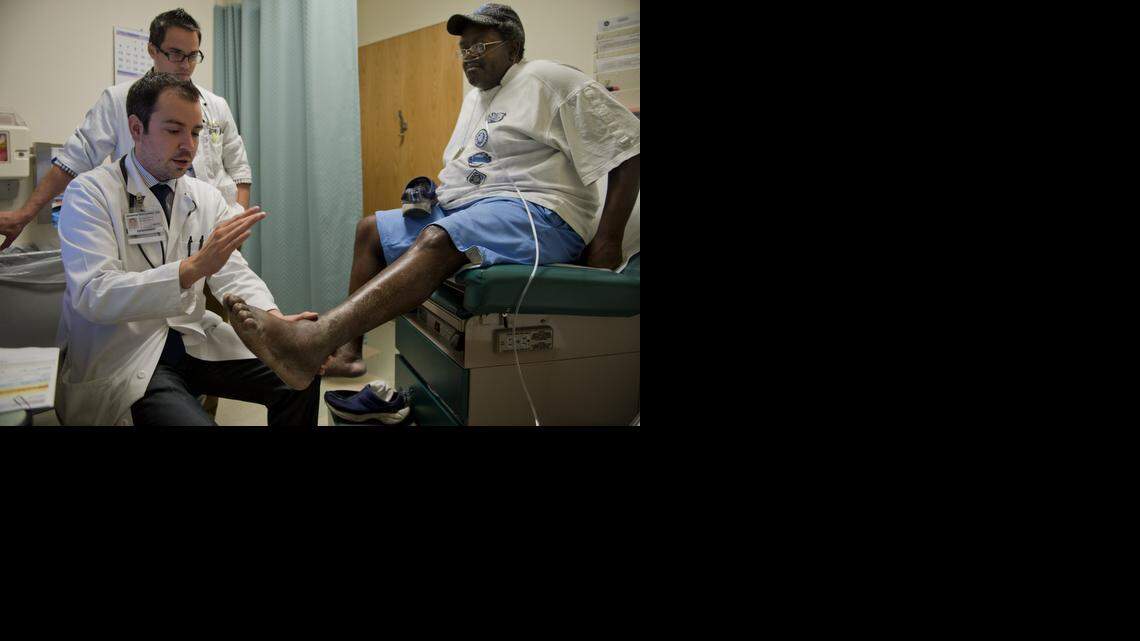 
Daniel Heidelburg, 51, a retired Para Transit driver from Oak Park, is examined by UC Davis Doctor George Gallardo.
