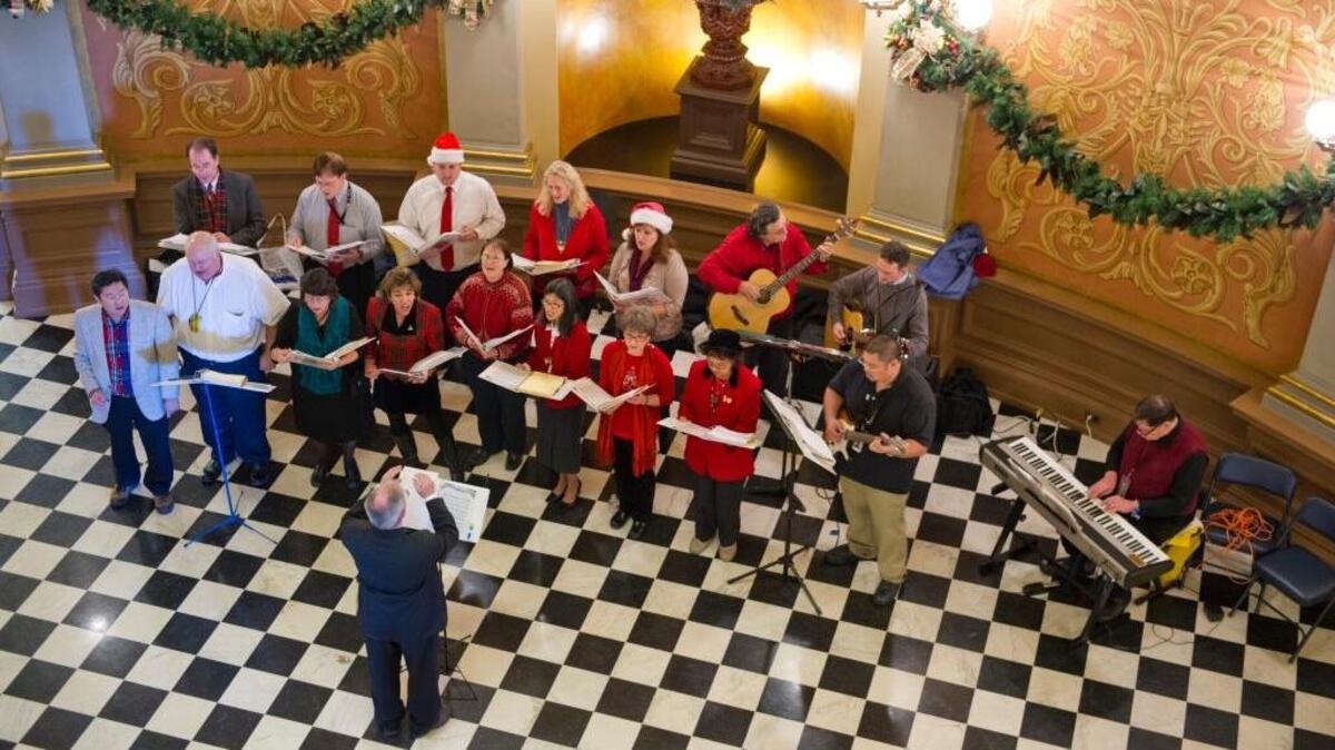 Members of the Caltrans choir perform at California's Capitol Rotunda during the 2012 holiday season. State employees are singing today at the statehouse.