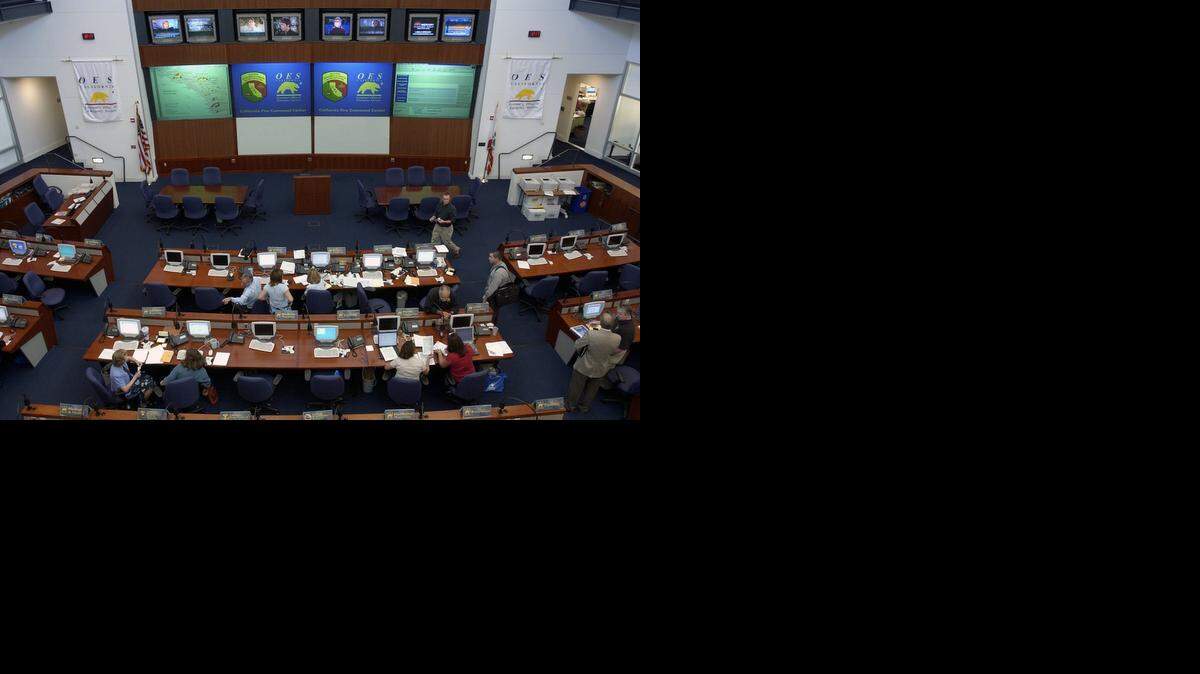 
Emergency managers coordinate firefighting activities for the southern California wild fires from the California Emergency Management Agency headquarters in Rancho Cordova, one of 11 properties at issue in a San Francisco lawsuit.
