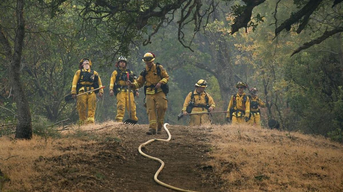 A proposed contract for Cal Fire firefighters would raise pay by at least 11 percent over the next four years. It also provides a number of salary adjustments that would offer bigger raises to experienced firefighters.