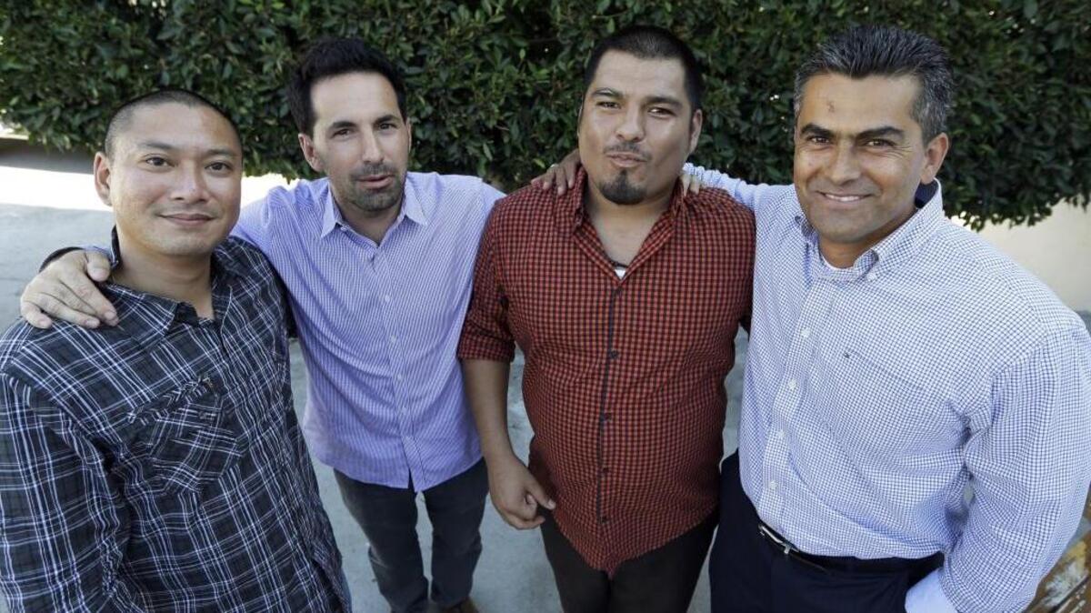 FILE - Francisco Carrillo, far right, poses with colleagues (from left to right) Jimmy Wu, Scott Budnick and Jesse Aguiar in Los Angeles on Aug. 16, 2013. Carrillo served 20 years in prison for a crime he didn’t commit, and in early June 2017 announced his intent to run for a California Assembly seat.