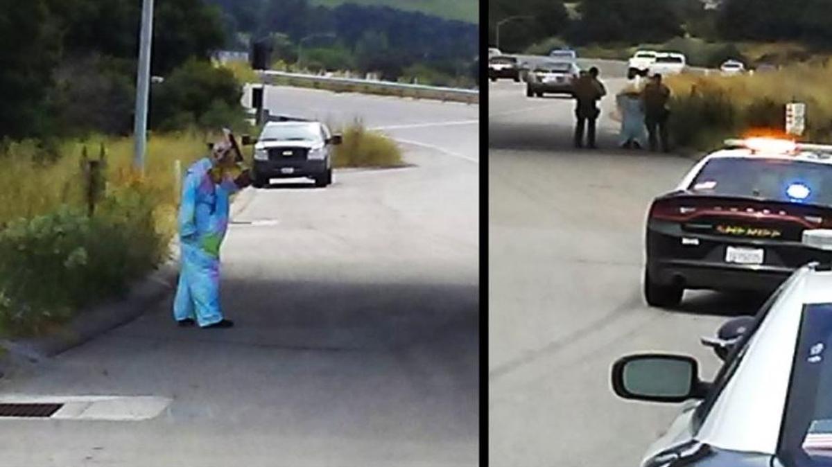 The man dressed as a clown is captured in this screen shot.