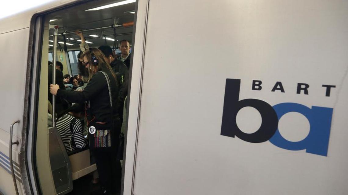 Bay Area Rapid Transit passengers wait for a BART train to depart the Fruitvale station in Oakland. BART officials say dozens of juveniles swarmed a train and strong-arm robbed passengers.