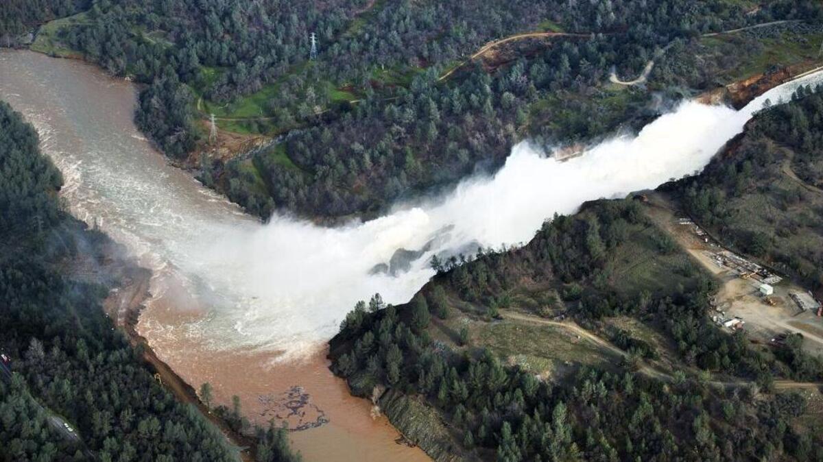 Water cascades down the main spillway at Lake Oroville on Monday, February 13, 2017 in Oroville.