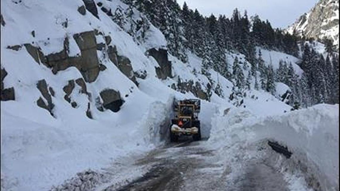 Crews try to dig out a 4-mile section of Highway 89, with some sections buried in up to 30 feet of snow, in the Emerald Bay area, January 17, 2017.