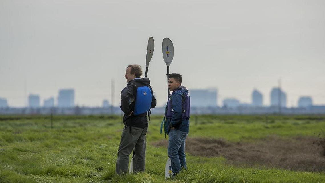 Natomas Basin Conservancy Executive Director John Roberts, left, and Field Assistant Jeremy Lor in the Natomas Basin Wetlands in Sacramento on Wednesday, February 3, 2016.