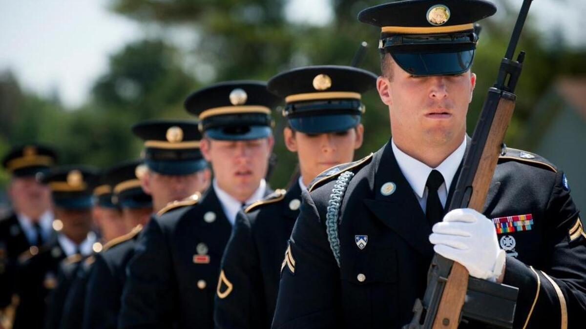 The California State Honor Guard pays tribute during Memorial Day at Mount Vernon Memorial Park and Mortuary in Fair Oaks.