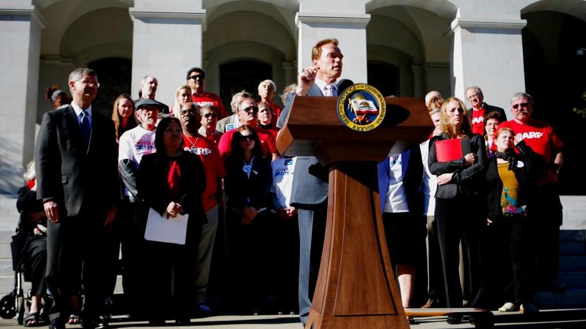 Gov. Arnold Schwarzenegger, with members of AARP and the League of Women Voters, announces support in late 2007 for Proposition 11, which redefined California’s redistricting process, allowing an independent committee to draw legislative and congressional districts. Sacramento Bee/ Brian Baer