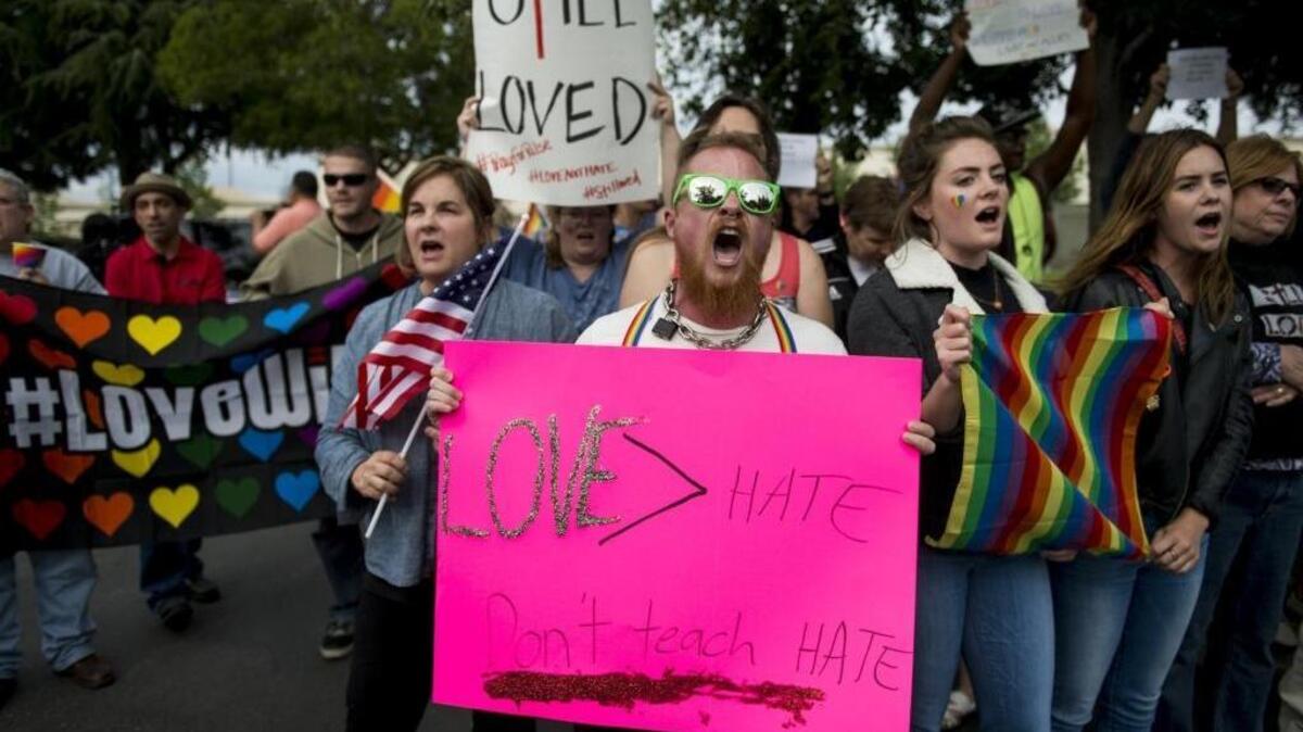 About 200 people protested outside Verity Baptist Church in Sacramento on Wednesday, after the pastor condoned the massacre at the gay nightclub in Orlando, Fla.