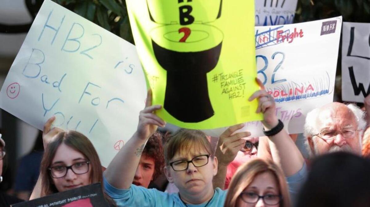 A crowd across from the North Carolina governor’s mansion protests House Bill 2, known as the “bathroom bill.”