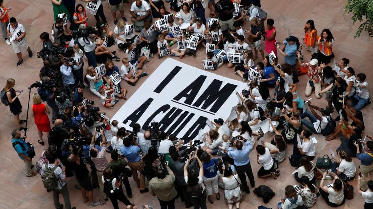 Families with young children protest the separation of immigrant families with a July 26 sit-in at the Hart Senate Office Building on Capitol Hill.