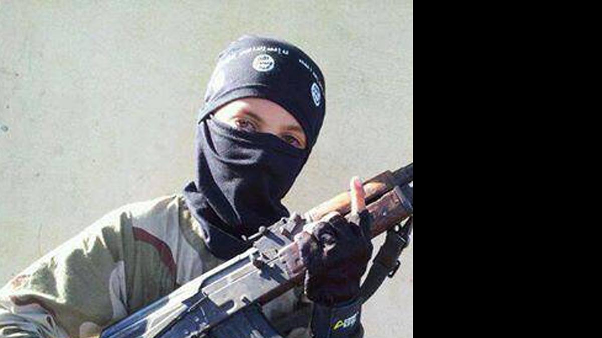 
Raqqa Is Being Slaughtered Silently, an anti-Islamic State organization, distributed this photo a child wearing a hat with the Islamic State logo posing with a weapon in Raqqa, Syria. Across the vast region in Syria and Iraq that is part of the Islamic State group’s self-declared caliphate, children are being inculcated with the extremist group’s radical and violent interpretation of Shariah law. 
