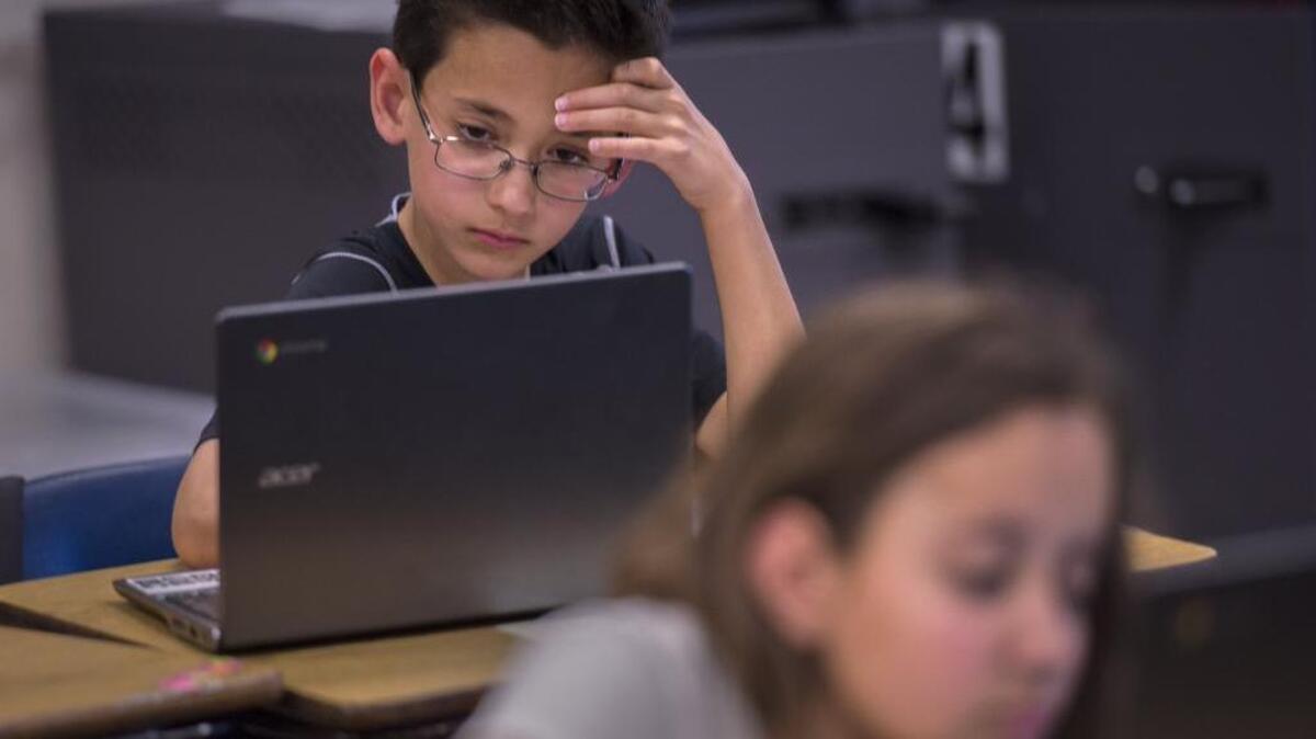 Students at Folsom Hills Elementary School focus on a practice test in 2015.