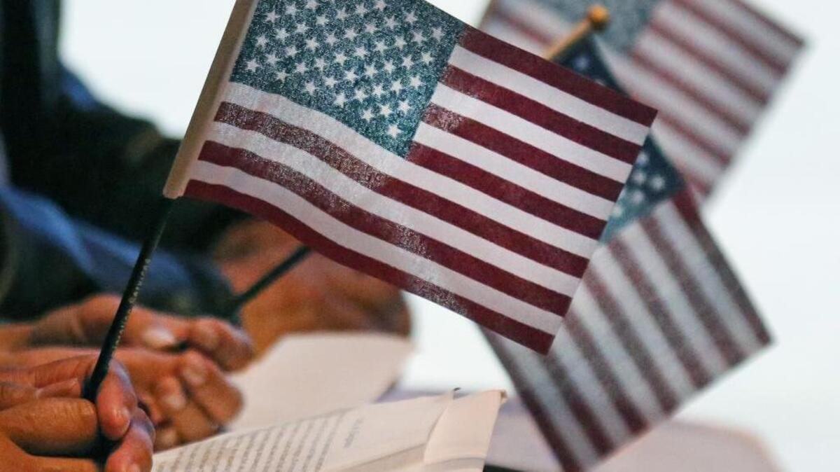 New U.S. citizens are sworn in during a naturalization ceremony at the Amon Carter Museum of American Art in Fort Worth, Texas, on November 20, 2017, just in time for the holidays. (Louis DeLuca/Dallas Morning News/TNS)