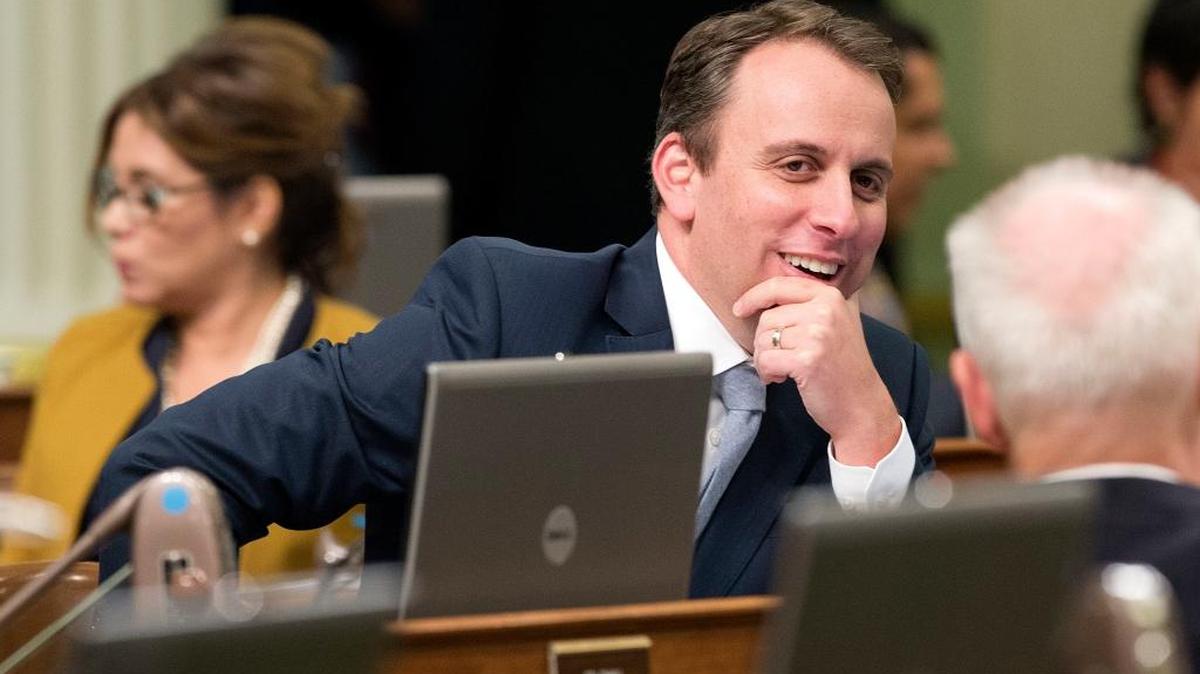 Assemblyman Marc Levine, D-San Rafael, smiles after the Assembly approved his measure designating denim as the state's fabric, Wednesday, Aug. 31, 2016, in Sacramento. With the two-year legislative session deadline looming at midnight and hundreds of bills left to vote on, lawmakers took time Wednesday afternoon to debate whether jeans are the right fit for California.