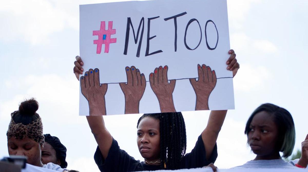Charde Jackson, center, a fast-food worker, joins a demonstration against sexual harassment at a McDonald’s in St. Louis on Sept. 18. The #MeToo movement has encouraged victims of sexual abuse to speak out, and could be a factor in voter turnout for the midterm elections.