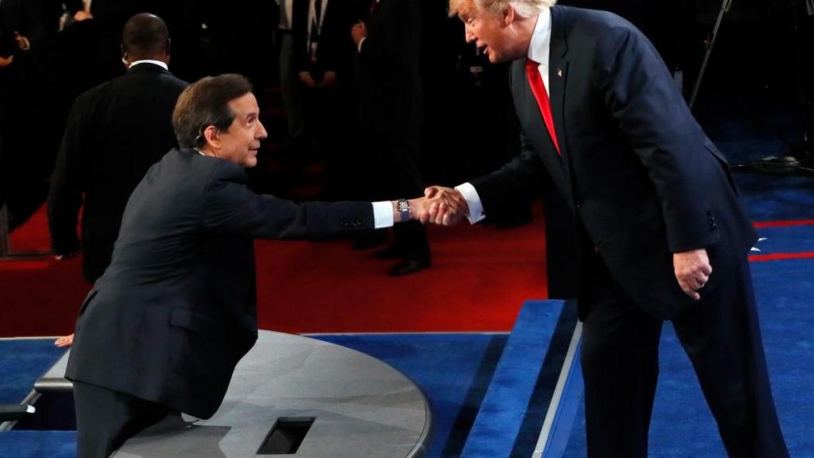 Republican presidential nominee Donald Trump greets moderator Chris Wallace, of Fox News, after the third presidential debate at UNLV in Las Vegas on Wednesday.