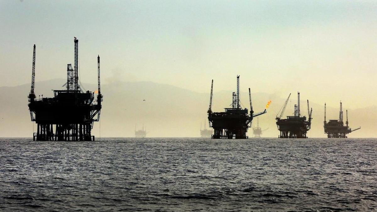 A 2015 photo shows a line of offshore oil rigs in the Santa Barbara Channel.