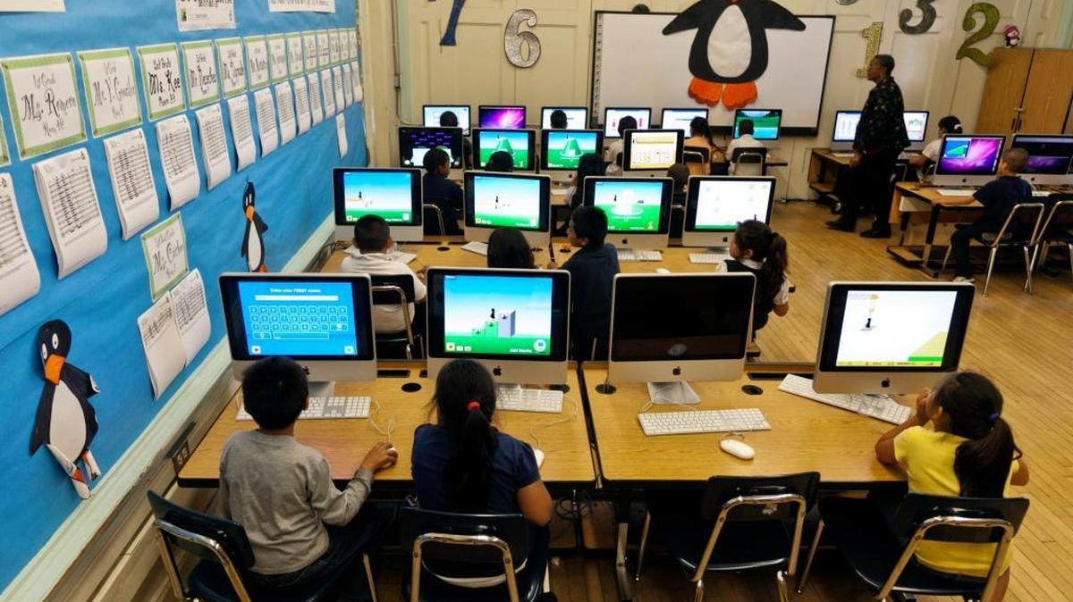 Students at Ritter Elementary School in the Los Angeles Unified School District practice their math skills. Critics have accused LAUSD of gaming the new school funding formula to channel money for disadvantaged students into teacher raises and schools in better off neighborhoods.