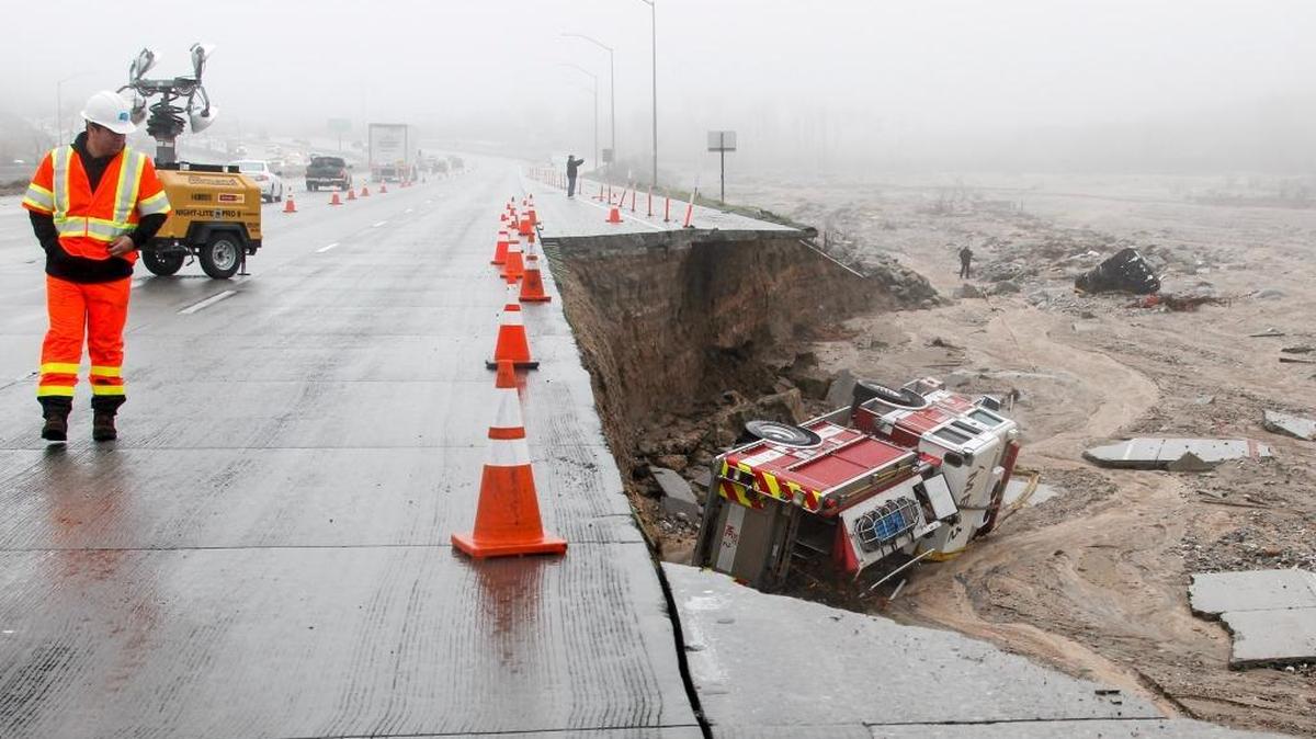 A San Bernardino County firetruck plunged off Interstate 15, when a lane and shoulder caved in due to heavy rains in the Cajon Pass on Feb. 18.