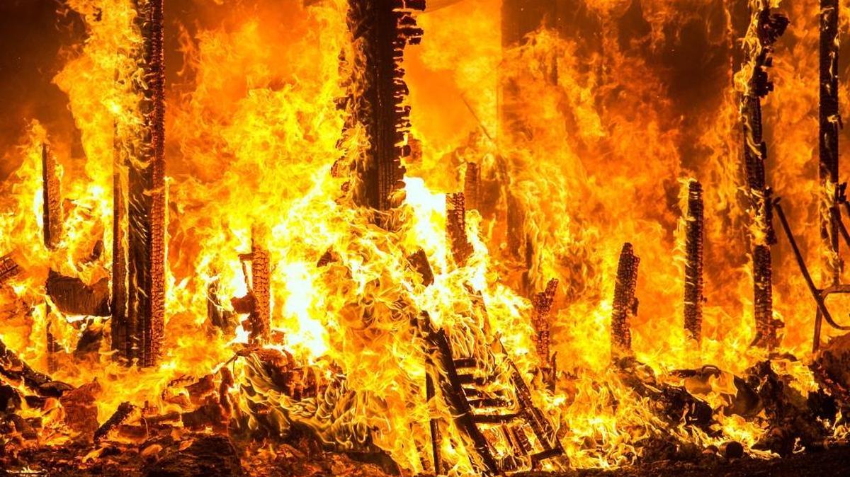 A home is destroyed in the path of the Valley Fire near the Lake County community of Seigler Springs last year.