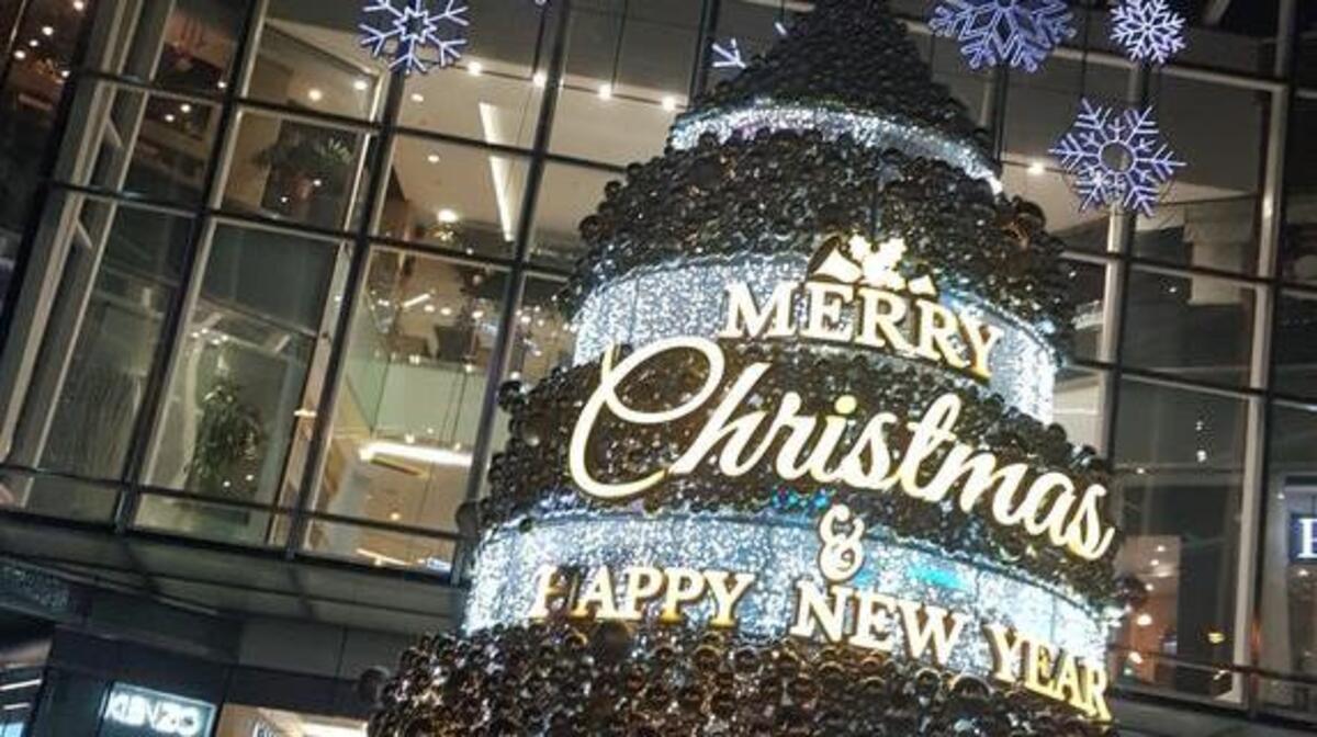 Christmas shoppers are welcomed at one of Ho Chi Minh City’s best known commercial complexes. Vietnam may be a communist country, but American-style holiday consumerism is a burgeoning trend.