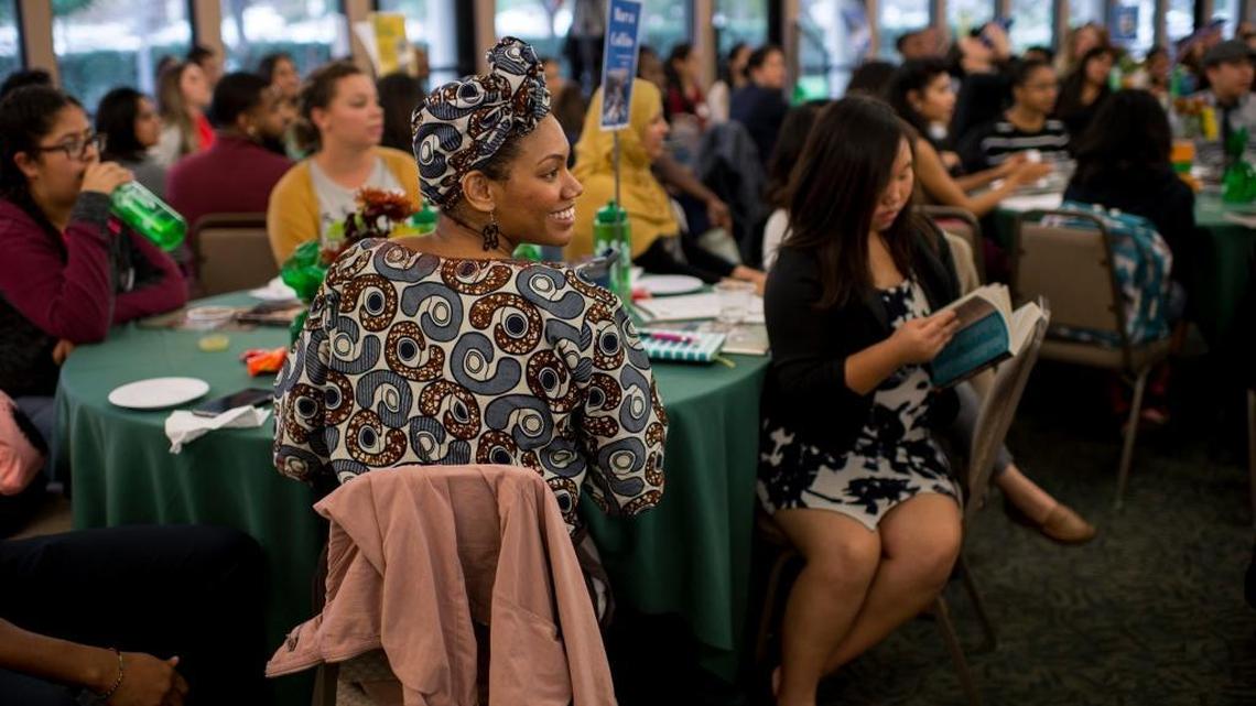 Eighty percent of California school districts reported teacher shortages last fall. Here, Dominique Williams, an English and ethnic studies teacher at Burbank High School listens at a 2016 Sacramento State teachers recruitment seminar.
