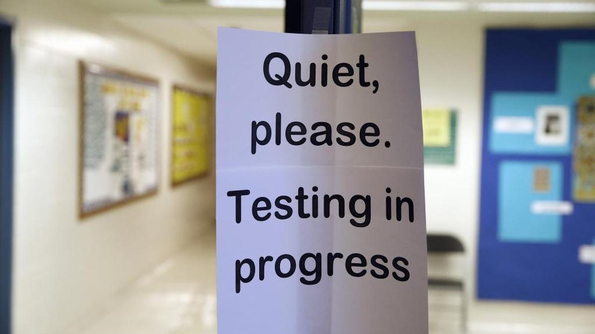 The SAT essay exam is increasingly rejected by college admissions officers, but the University of California continues to use it. Here, a sign asks for quiet during a college test preparation class in 2016.