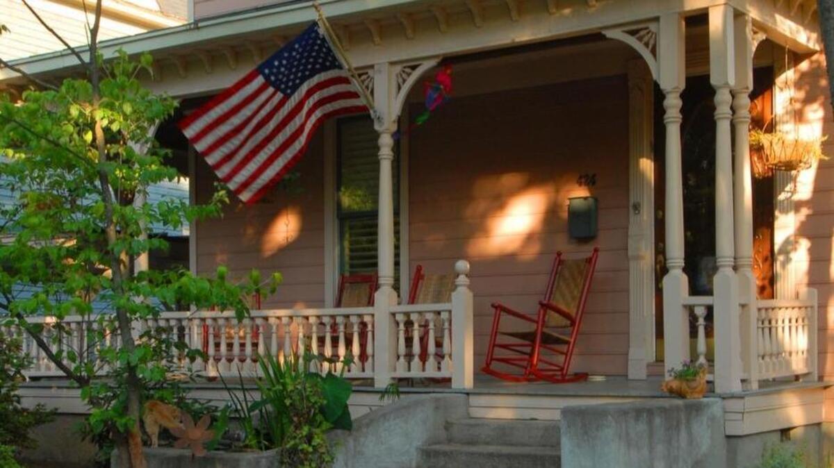 An American flag marks the Memorial Day holiday on homes across the country.